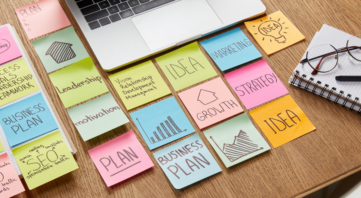 sticky notes with business plan elements